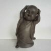 Happy Shaolin hand on head
