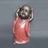 Happy Shaolin hand on head