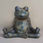 meditating frog statue