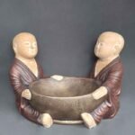 Two Shaolin with Bowls