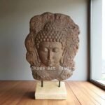Relief Budha head standing