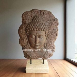 Relief Budha head standing